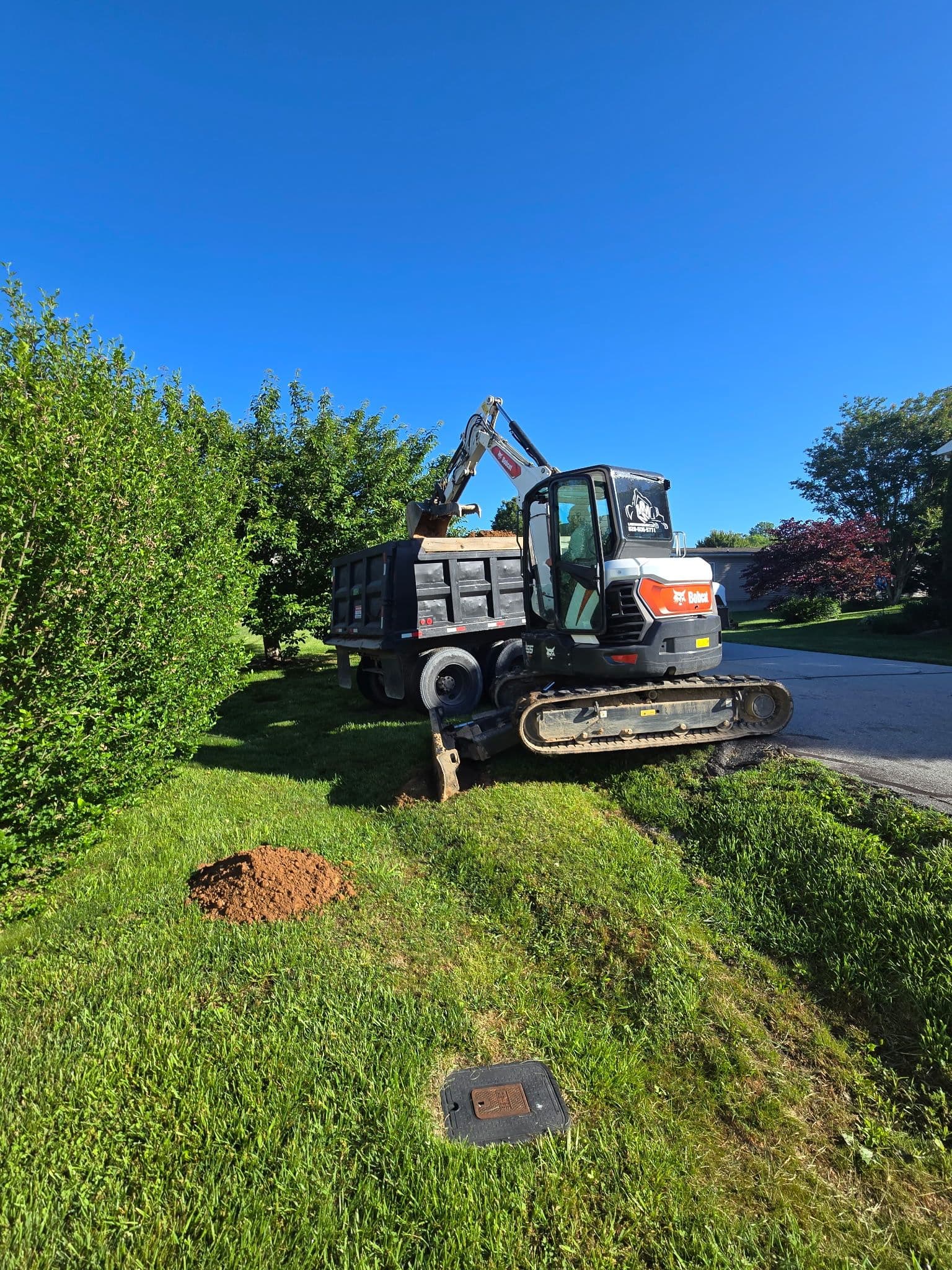 Project Stormwater Pipe Repair and Berm Installation in Hendersonville image