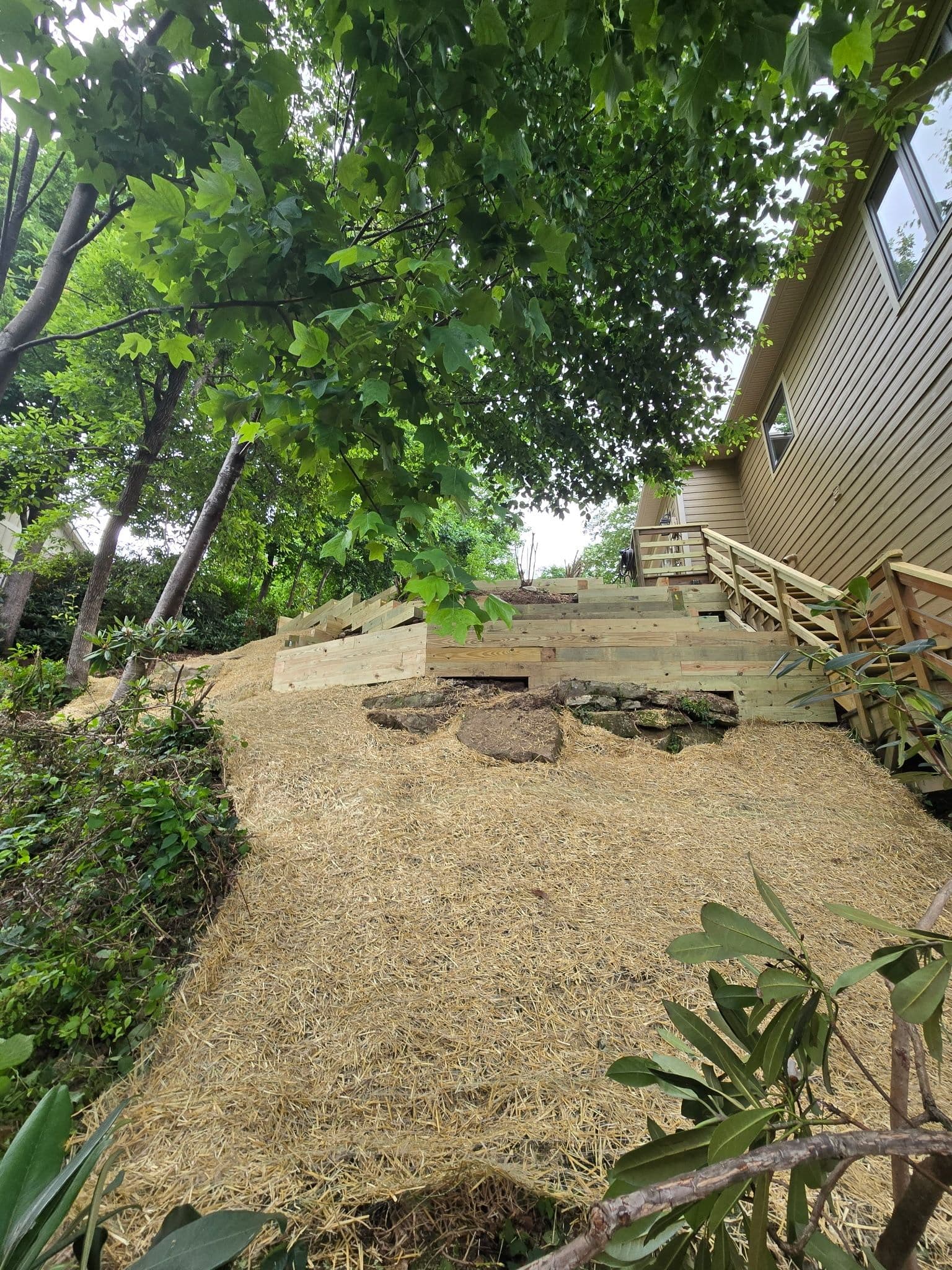 Gallery photos for Slope Drainage and Retaining Walls Tackle Laurel Park Washout: Image #1