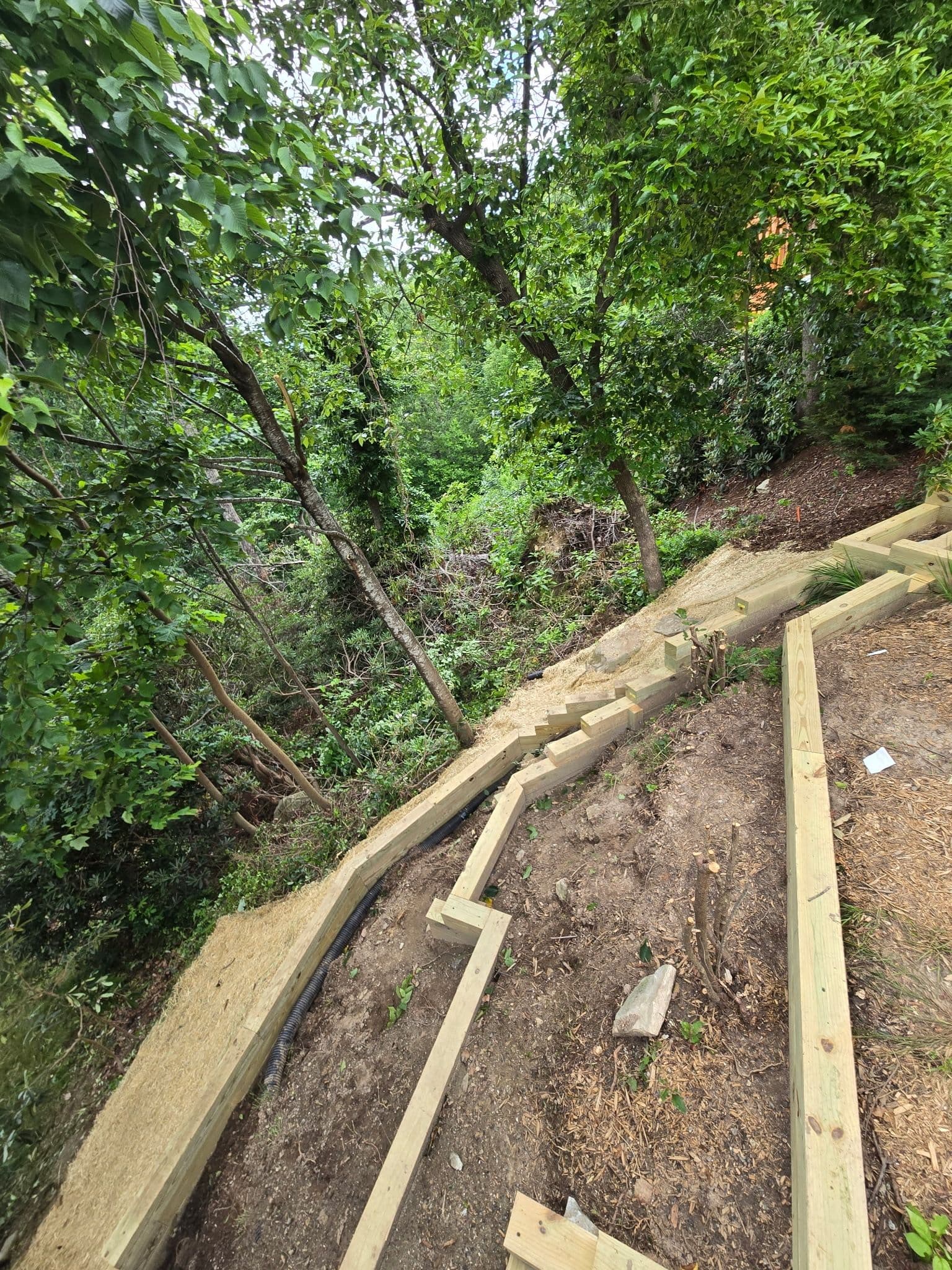 Gallery photos for Slope Drainage and Retaining Walls Tackle Laurel Park Washout: Image #3