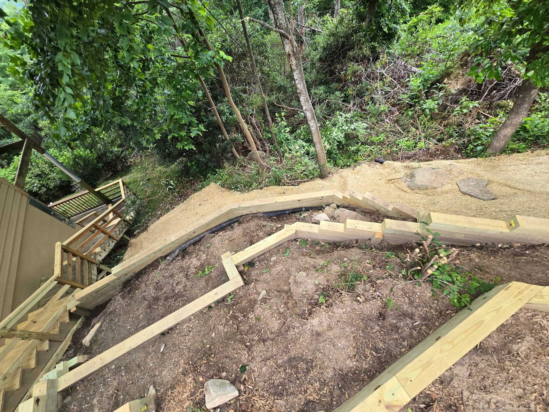 Gallery photos for Slope Drainage and Retaining Walls Tackle Laurel Park Washout: Image #2